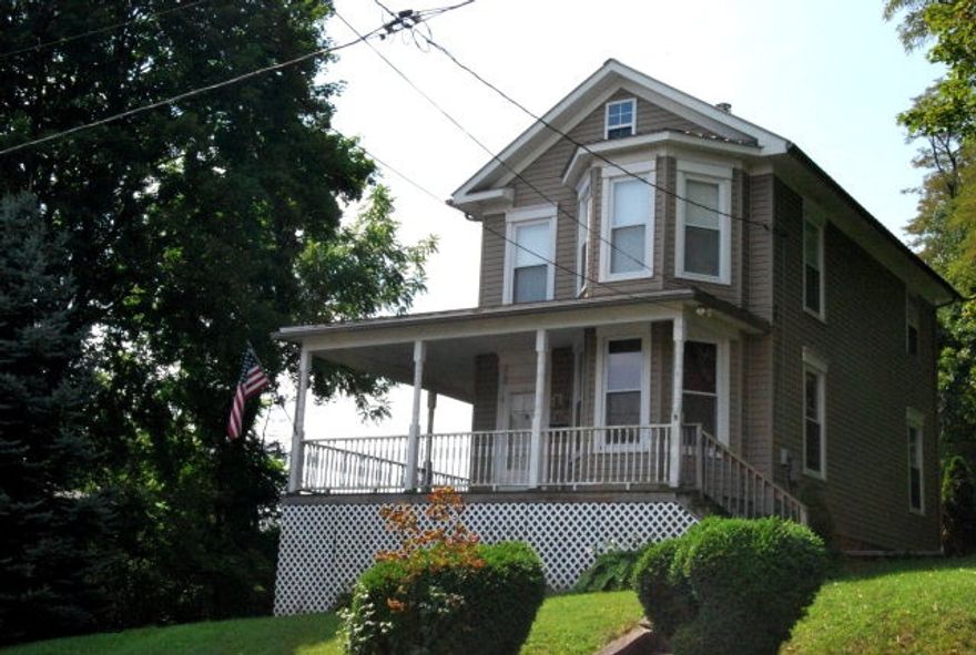 Beautiful 2 BR/ 1 BA Victorian Style home. Large eat-in kitchen and a fresh coat of paint throughout. Enjoy this spacious and private lot with a large wrap-around porch. This house is priced to sell as-is. Must see!