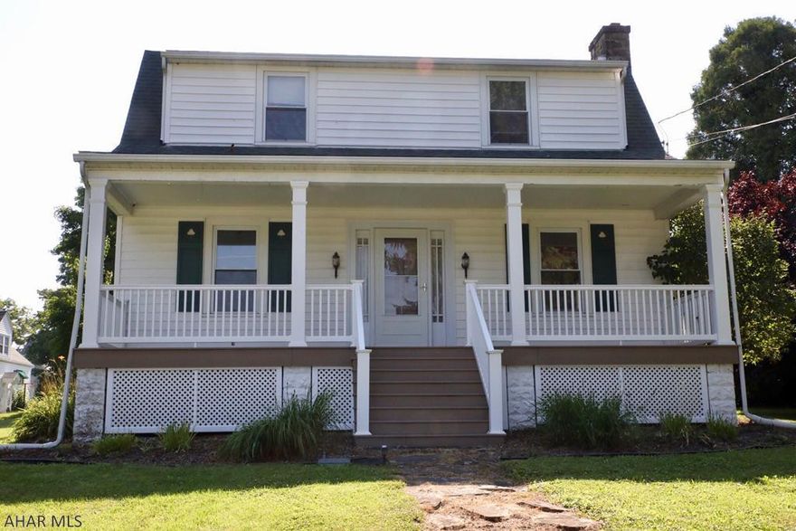 Very nice family home in a great neighborhood on a double lot. New front porch, driveway access in rear, detached garage.  Beautiful hardwood floors throughout house. Move in ready.