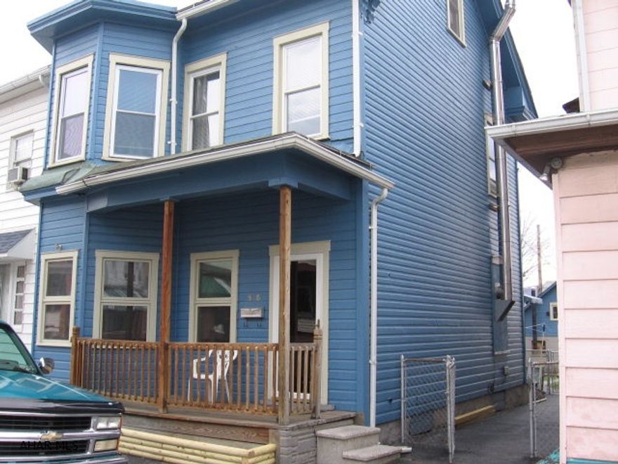 Updated Kitchen.  New Windows.  Newer roof.  Two Car Garage, fenced yard with patio.  Finished attic or 4th Bedroom.  Laminated floors.