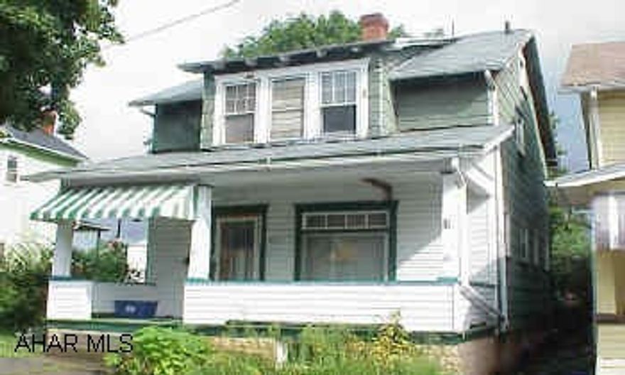 lots of potential-needs work, large rooms.  Covered deck off kitchen.