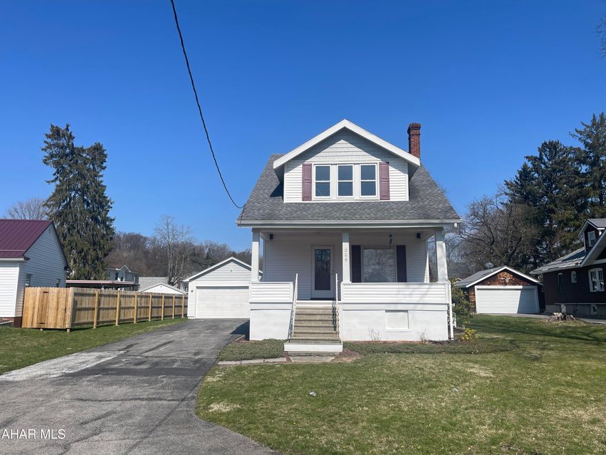 BRAND NEW PRICE!  Owners took pride in ownership and it shows! Not only is their home ''move in ready'' but it's so meticulous!  After cooking dinner in the updated kitchen that offers Quartz countertops, dove-tail constructed soft close drawers, and Stainless steel appliances (including a 5-burner stove) - you can snuggle up near the gas fireplace in the Winter that is found in the living room   If that's not enough - there is a lovely family room (adjacent to the kitchen) that could also be a 4th bedroom and there is also a very nice full bath attached.  2nd level offers 3 spacious bedrooms and a STUNNING full bath.   Park your cars in the 2 car detached garage.  Entertain friends/family on the spacious rear deck and play volleyball in the large and level lot.  This home is truly a GEM!!!