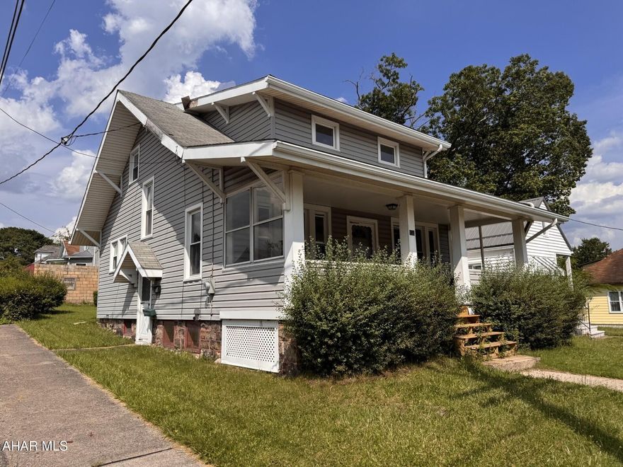 Character describes this 3 Bedroom cape cod vinyl sided home on corner lot.  There are oak hardwood floors, built-ins & trim throughout.  Gas, hot water radiator heat.  Ready for someone to remodel it into a great home.