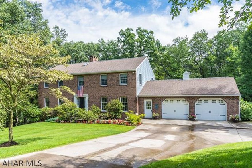 Country living at its finest. Nestled on a beautiful wooded parcel this is a wonderful 4 bedroom, 3 bath home with outstanding amenities. Warm and friendly updated kitchen with brick fireplace that adjoins relaxing family room and open air deck overlooking the heated in ground pool and woodlands. Beautiful hardwood floors, large master bedroom suite, rec room w/fireplace & heated sunroom are just a few of the solid qualities of this lovely home. Home offers a 35 minute commute to State College. Located 5 minutes from the Pinecroft exit of I99. Home location is ideal for someone who wants an easy commute to State College without all the hassle of living in a college town.