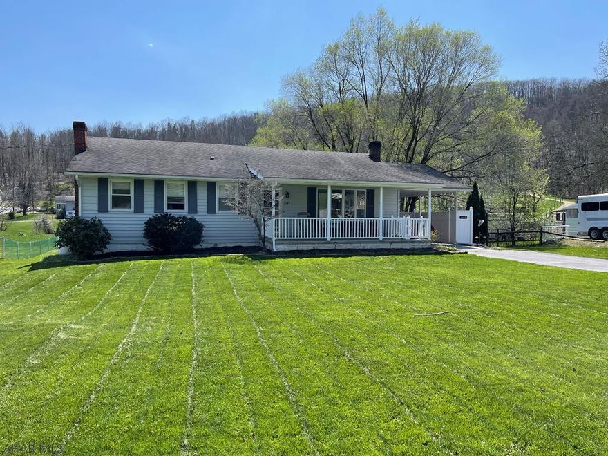 One story living in "country" setting - yet minutes from everything.  Convenience meets Serenity!  Bedrooms are large and the Master suite has personal bath and 2 closets.   There is a large AND level yard with a lovely pond and raised beds for vegs -- already ready for planting:)   Finished (walk out) basement gets lots of natural light and provides a great space for office and still lots of room for nice family room w/gas fireplace.   Enjoy the peaceful deck and private back yard to unwind after work!  Tons of parking for several cars -  Call listing agent for your private tour. This home will not last long!  Basement offers separate Elec panel for Generator, but previous owner took generator w/them.  Current owner pays $742 for flood insurance.