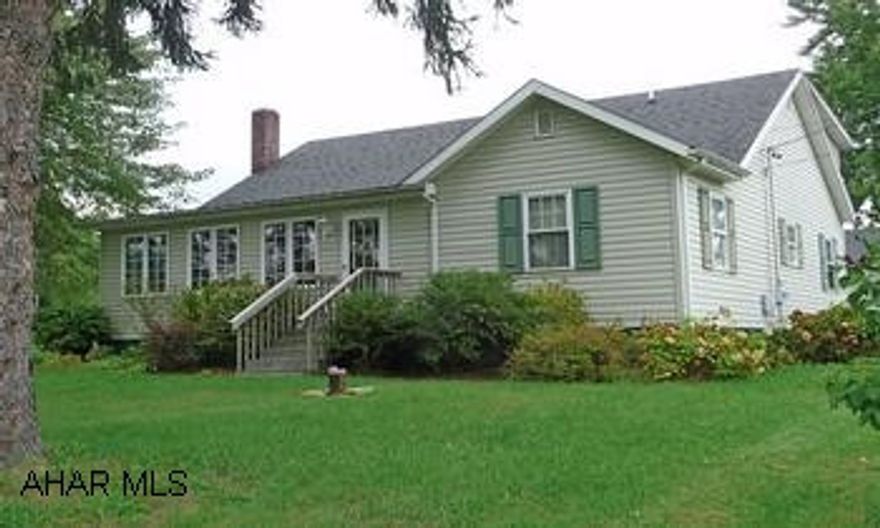 1 1/2 story 3BR/2.5BA with detached workshop. Central AC, well, city sewage, newer kitchen, appliances included. New windows, covered porch and close to town and schools. Beautiful cape cod style home with 3BR/2.5BA. Central air, oil forced air heat, vinyl siding, newer windows, new kitchen with refrigerator, stove, dishwasher and freezer included. Close to schools and shopping,