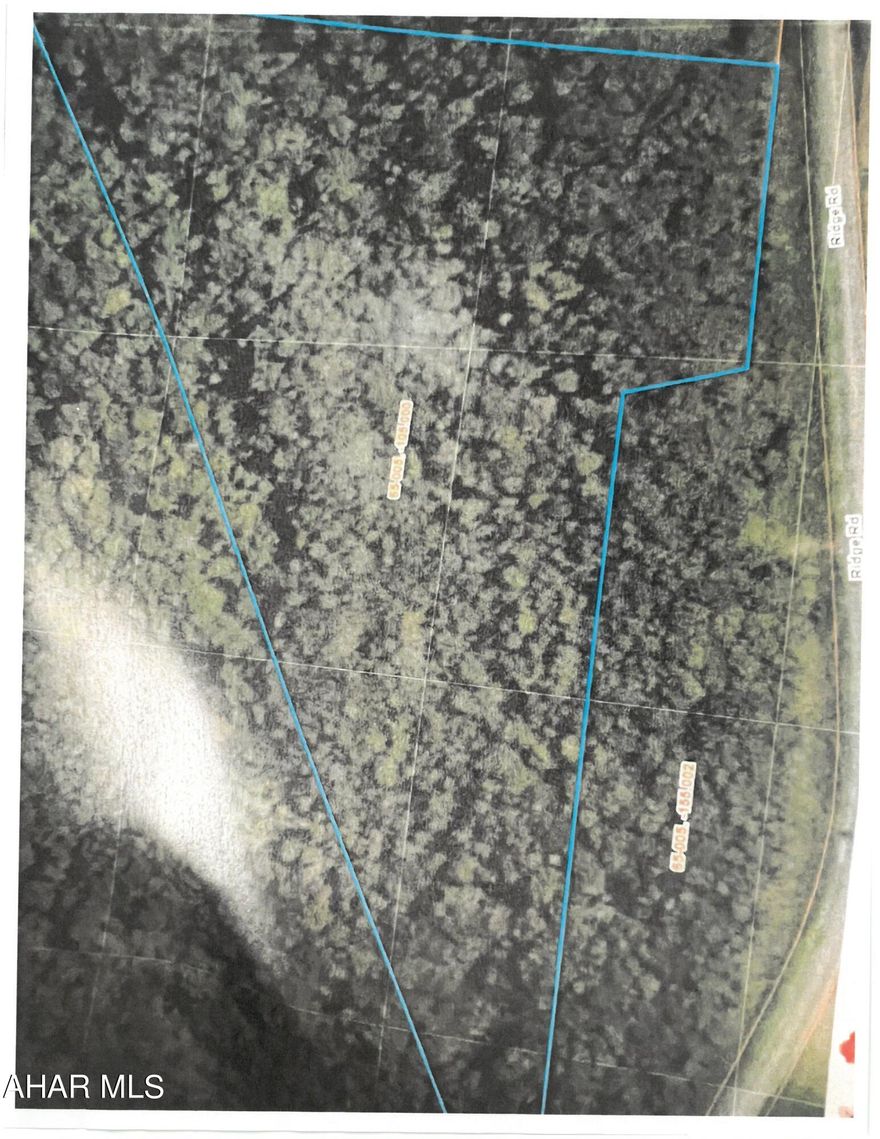 Wooded tract of land with no road frontage. Hilly hunting site timber growth. Located between Carrolltown and Nicktown on the ridge road.