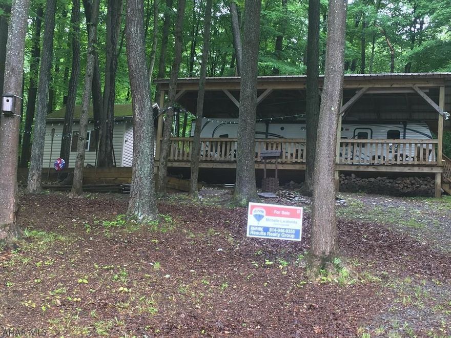 Very Well Maintained. 2014 Keystone Hideout. Sleeps 12! Beautiful Private Wooded Lot. Lots of Storage. Includes Cold Weather Winterization Package. Automatic Awning. 12 x 31 Covered Deck. 14 x 10 Shed with 8ft Ceilings...could be used as a Work Shop, Extra Sleeping Area or Storage. Outside Shower. So much to mention. One owner. This beautiful Camper was bought and driven directly to Sagauro Circle. Has always been under roof. Enjoy the Community Pool, Basketball Courts, Volleyball and Tennis. Gated Community.