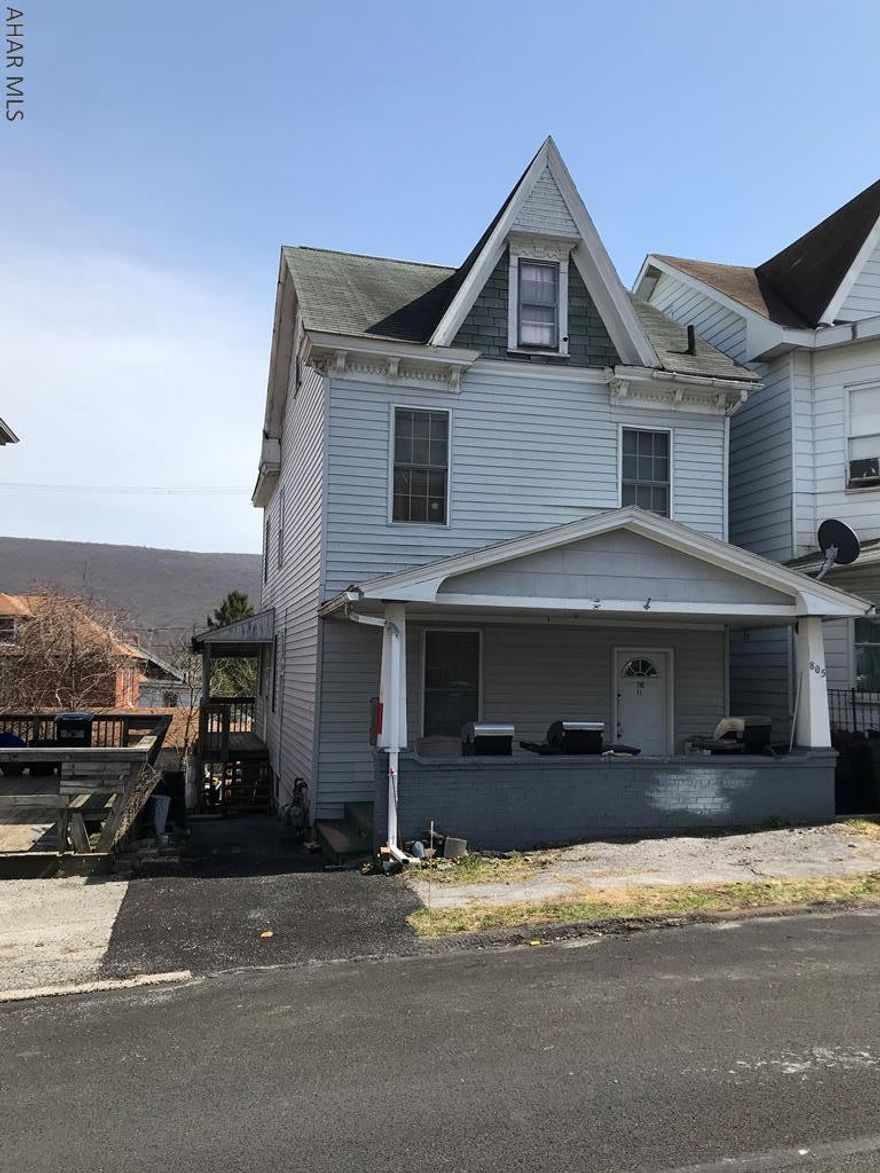 Attention landlords - investment opportunity!  Centrally located 2 story house - 1st and 2nd floor apartments with current tenants. 1st floor has 1 bedroom and laundry area, 2nd floor has 2 bedrooms.  Off street parking is available.