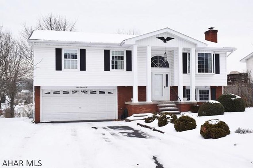 This great home in East End has just had a facelift!    New bathroom, updates to kitchen, living room, and entry.  Ceramic tile entry, dining room with beautiful built-in cabinets.  Quartz countertops in kitchen.  Family room with gas fireplace.  Central vac, central air.  Large wraparound deck from main level and lower deck off family room.   Top notch landscaping, huge yard.  Newer vinyl siding and driveway completely redone a year ago.  New furnace in 2016.  This home is located on a quiet cul de sac and is in move-in condition.    HOME WARRANTY INCLUDED!