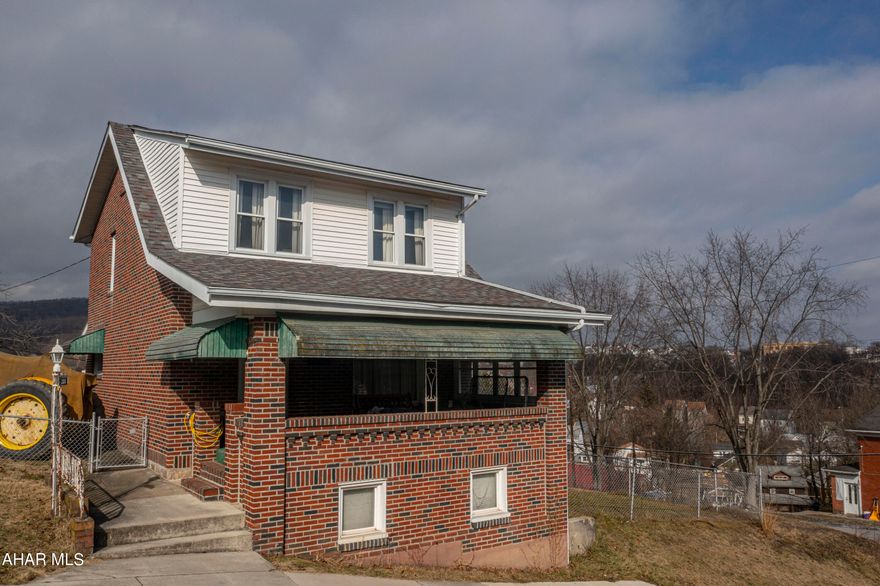 Well maintained and move-in ready, this solid brick home has a ton of potential! 3 bedrooms, 1.5 baths. This house has the perfect corner lot and is located in a convenient area within Altoona. Rooms are spacious with lots of storage space. Tons of character with beautiful original woodwork throughout. A cozy covered front porch and a large, fenced-in yard provides lots of opportunities to enjoy being outside. Roof replaced in 2022. Large shed offers even more storage.