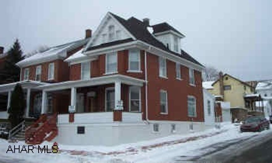 Large, 2 1/2 story brick home. Maintenance free and in move-in condition. Lots of windows. Corner lot. Full basement with 7' ceilings is clean and dry. Finished attic.