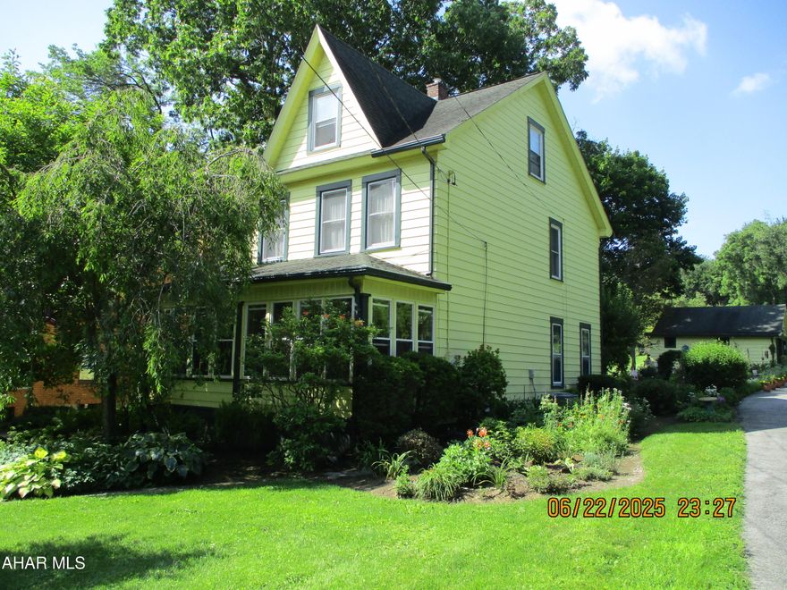 Check out this classic, lovingly cared for two and a half story home.  The first floor features an inviting living room, formal dining room, equipped kitchen and breakfast room, enclosed front porch and 1/2 bath.  Three bedrooms and full bath with jet tub on the second floor with a large fourth bedroom on the third floor.   Spacious off street parking and two car garage.  Numerous mature flower gardens!   Great location for the growing family yet close to all amenities.
