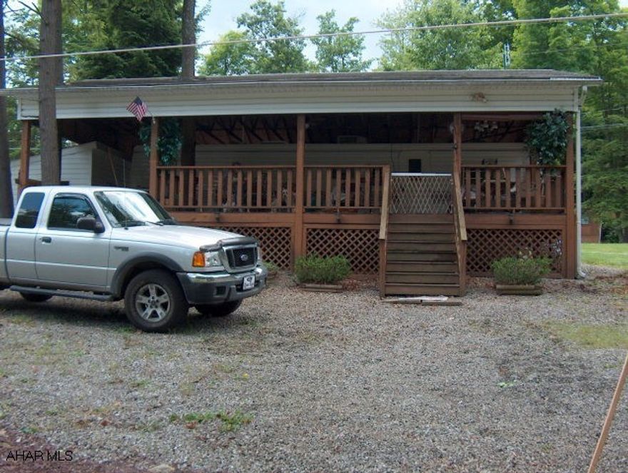 36 ft Dutchman camper w/ 2 pull outs & covered pavillion & shed. Located in Glendale Yearound (a gated community) this camper can be used yearound as water line is under frost line.