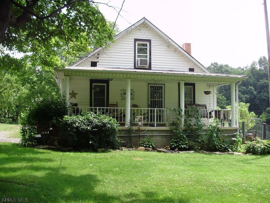 Small two bedroom house with front porch and rear deck. Large fenced in pet area and the rear porch. Very nice kitchen with ceiling fan and center counter A lot storage building for your car or other items, Large work shop building. A children play house and a large either Boat or RV covered building for storage Two extra sites for a hook up to your RV or travel trailer. Most of the furniture stay along with the lawn furniture, grills and a hot tube. Electric fireplace. To much to list