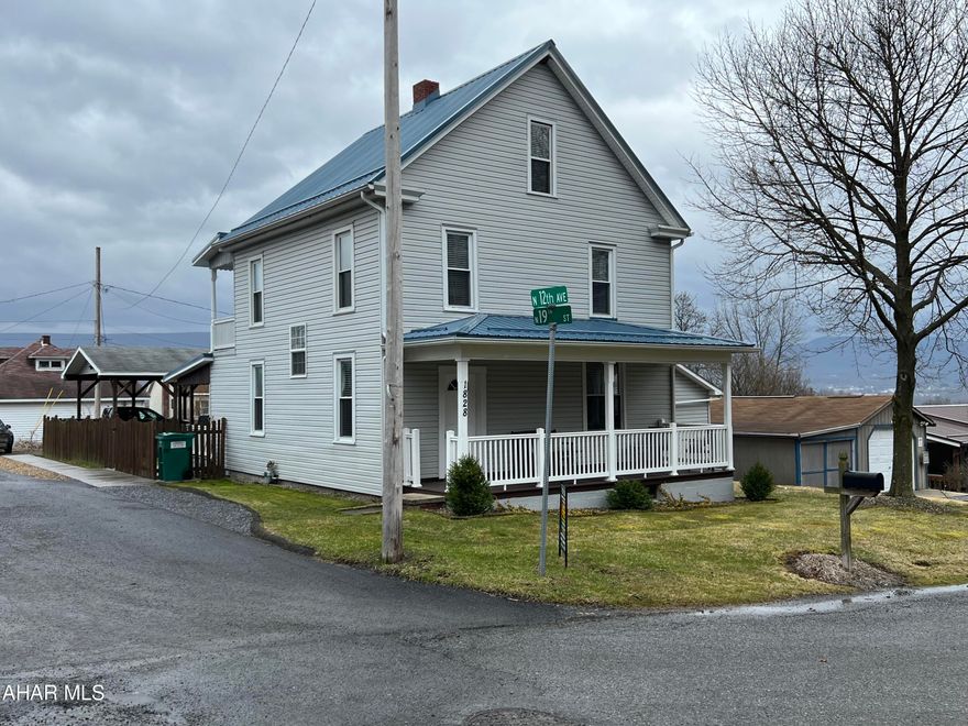 Welcome to this beautiful home with tons of updates on a corner lot in Juniata! Walk into the foyer with a gorgeous storage bench & double stairway. Wait until you see the charming pocket doors separating the LR & DR! Second floor BR's are all spacious with closets.  There is a Juliet Balcony on the second floor as well.  Master BR and bath with claw tub & exposed chimney are on third floor and wait until you see this view! Home is complete with a hot tub and fenced in yard.  Call listing agent to tour this beauty today!