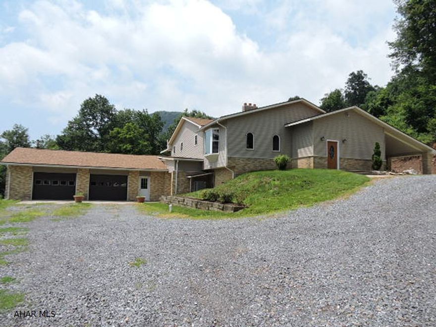 Gorgeous one story home with many luxury features.  Gourmet kitchen with walk-in pantry and stainless steel appliances.  Huge master bath with clawfoot tub and walk-in shower.  Property adjoins State game lands for the hunter.  Basement features a large kitchenette with laundry and big rec room.  Woodburner supplements heat.  24'x40' barn and above-ground pool.  Unheated bonus room off basement for storage or workshops.  Oversized 2-car garage with workshop.