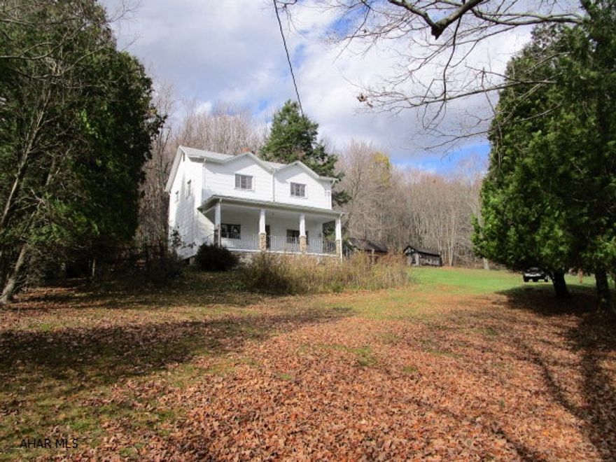 Beautiful mountainside farm featuring 130 acres. Discover this unique property located in Milligans Cove, just minutes to White Sulphur Springs and thousands of acres of state game lands. The property offers approximately 25 tillable acres and remainder is wooded with timber value (timber cruise on file). Located on the site are fruit trees, variety of berries, grapes, wild honeysuckle, ginseng & fresh water springs. Improvements include a 2-story farmhouse with hardwood floors throughout, large bank barn, stone springhouse & other weathered wood outbuildings. Home features 3-beds, 1-bath, kit, dining & living rms. New shingle roof in 2014, oil forced air heat, and covered front porch for mountain views & morning sunrises. Home and improvements are nicely situated off the road for privacy.