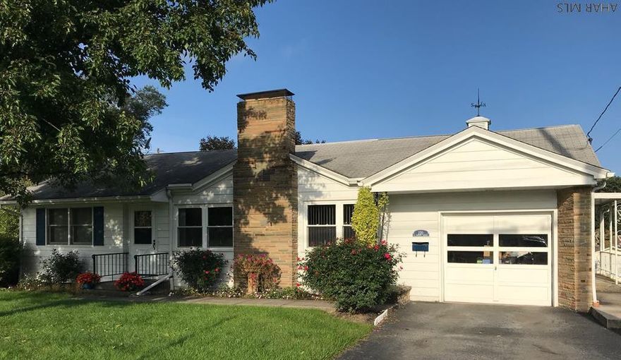 Your future Home is right here!  Don't let the 2 bedroom fool you because this home has tons of space and potential! Located on a large Corner lot in a wonderful neighborhood right across from the Memorial Park, and close to all the dining and shopping that Martinsburg has to offer. This home has a Huge finished basement. Great for a theater? Home Gym? Or would be perfect for a 3rd and 4th bedroom or in-law suite. Equipped with a new Natural gas On Demand heating system that provides heat and hot water! Who wouldn't love saving $ in heating costs? Central Air, Water softener, 1-3/4 bath and a Brand new deck overlooking the spacious back yard. Large kitchen with tons of storage, Walk in closet, and a Massive living room.  Beautiful Built-in cabinets and a Brand New Roof!!