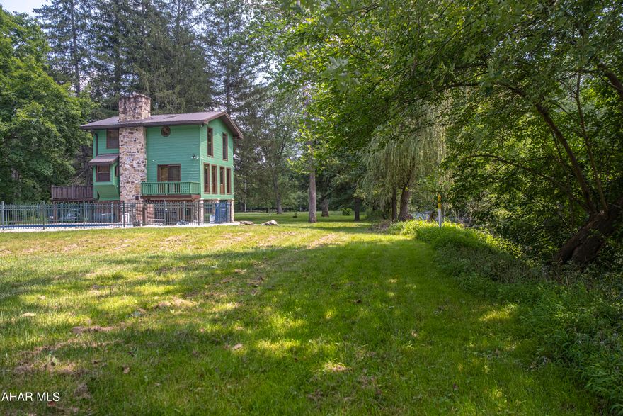 This unique riverfront property is your vacation escape. Loft home with lots of windows overlooking the Juniata river and train tracks bordering the land where you can watch the steam locomotive on excursions.  Launch your kayak or fish from your bank on the riverfront. An outbuilding provides ample storage out of the flood plain. Split units allow for efficient heating and cooling. Enjoy the inground heated swimming pool and make this your entertainment oasis.  Note maps attached are for illustration and reference only - all boundaries are to be verified by the buyer.