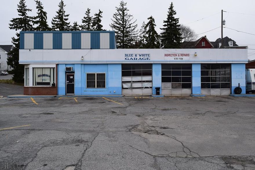 High traffic count 0.45 acre corner in downtown Altoona with three car repair shop and car lift. Currently tenant occupied.