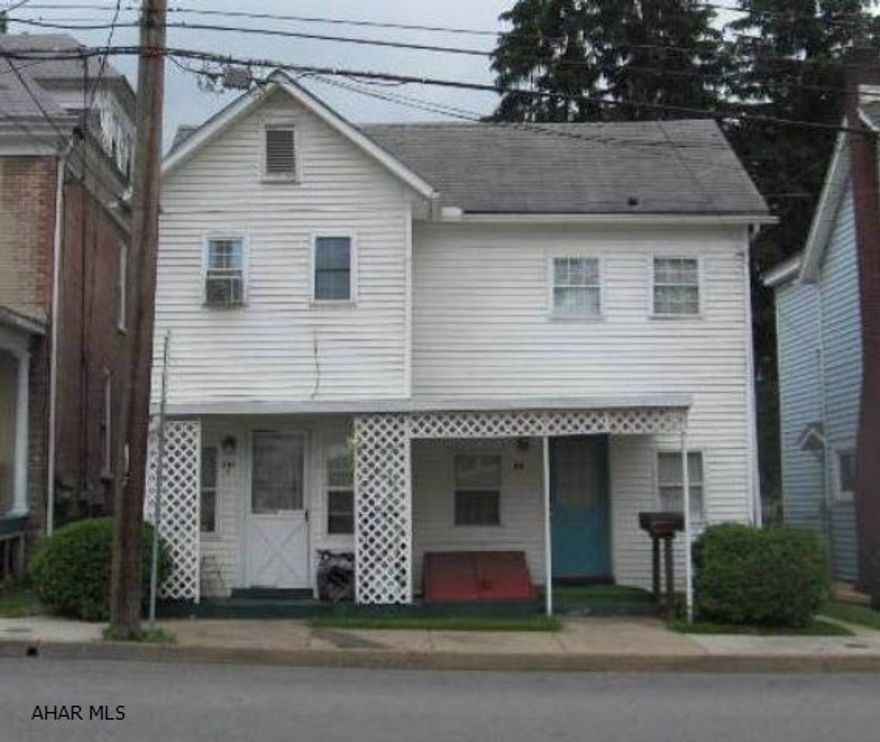 Opportunity awaits with this four unit apartment building.  Located within walking distance to downtown Bedford and has off-street parking.  A great investment!