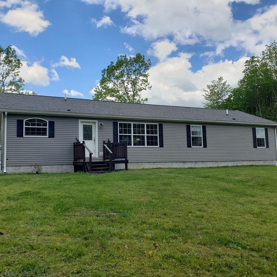 Well maintained ranch home on just under 3 acres. This home has been meticulously kept! The master with full bathroom and walk in closet is very spacious! The beautiful upgraded kitchen is open to the dining room, living room and office area, making entertaining a breeze. Two nice sized bedrooms, full bath, and laundry complete the first floor. The full basement is finished for additional living space. Outdoor living at its finest with almost 3 flat acres and plenty of room for activities.  Call listing agent for more information.