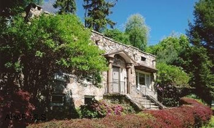 PRIVATE PICTURESQUE STONE HOME IN PRESTINE CONDITION WITH BEAUTIFUL VIEWS.  TWO UPDATED BATHROOMS AND VINTAGE ATTRACTIVE KITCHEN, UNIQUE COVERED PORCH AND REAR PATIO.  SIX SPACE PARKING LOT.  GOOD MECHANICS.  HOME WARRANTY.  VISIT VIRTUAL TOUR AT TREB.COM.  CALL ELLEN 937-0062.