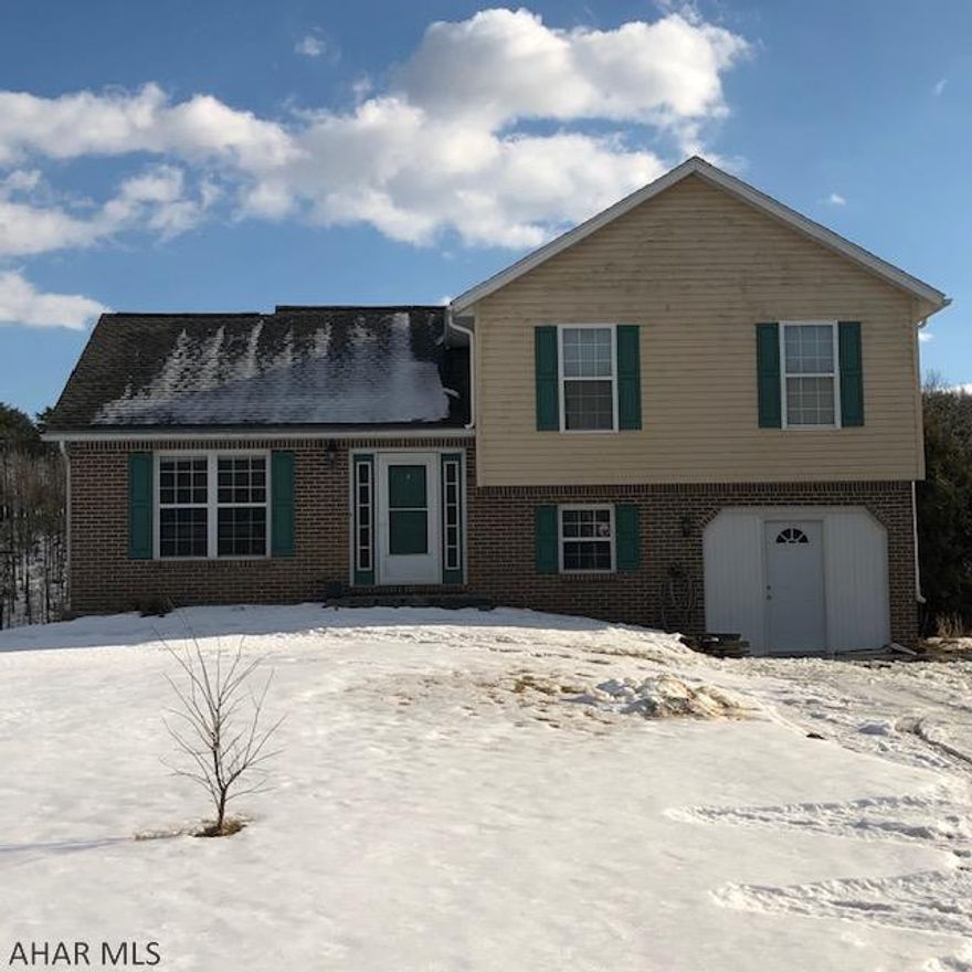 Come see this hard-to-find Dutch Corner home surrounded by beautiful views of the nearby mountains and ridges. Enjoy 8.6 acres of country living as you relax on your rear deck or plant your garden in the open fields. This home has upgraded bathroom vanities and floors, ceramic tile flooring in kitchen/dining area, a new roof in 2018 and a spacious 24 x 36 two-car garage built in 2018. There is a converted integral garage that adds more storage space or turn it in to additional living space. This home has so much to offer and won't last long!