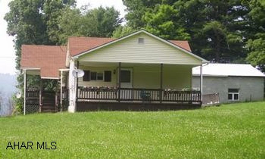 Ranch on 3 acres with detached 2 stall, 896 sq. ft. garage. Mobile home on property, no utilities to trailer. 3 Acres wooded, close to Route 70. Being sold as Short Sale - offer must have lender approval. Many tires on rear of property at creek bed.