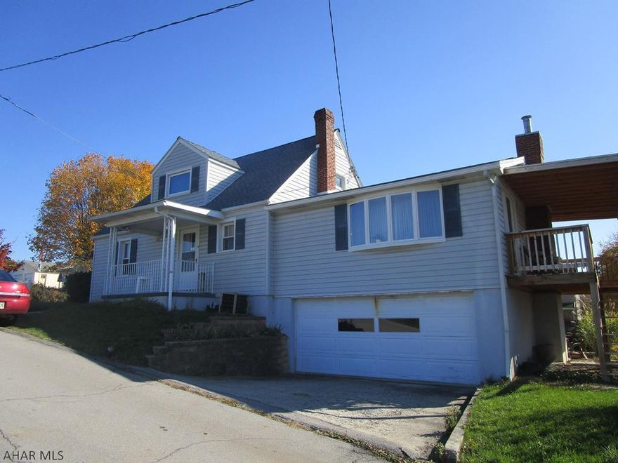 Attractive 1.5 story home on a landscaped lot featuring 3 bedrooms 1.5 baths, large family room addition with gas fireplace, oak kitchen and integral 2 car garage. front porch and rear deck.  Well maintained home reflecting pride of ownership.