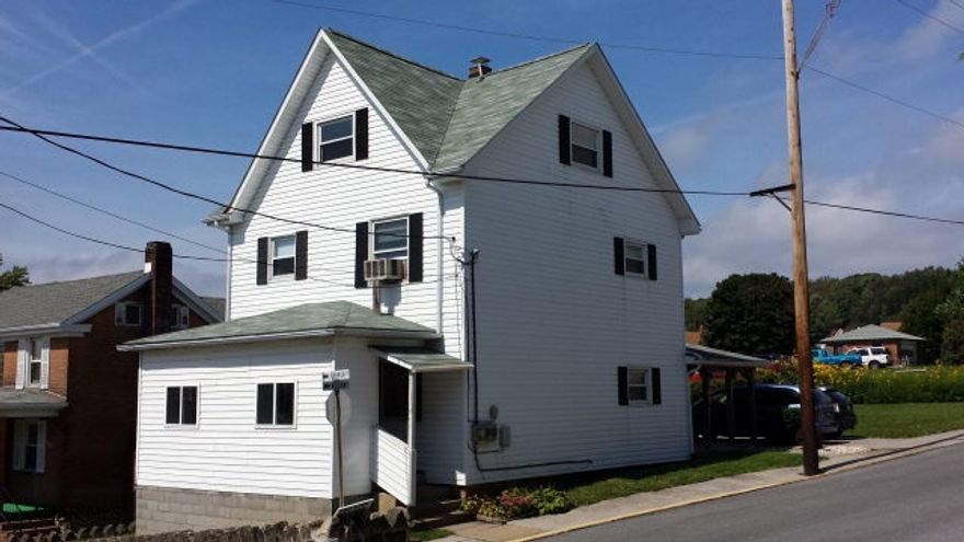 Potential 5 Bedrooms, 3 bath residential property.  Sellers will separate electric.  This well maintained building has new chimney liner, new windows, furnace, roof and siding.  Six parking spaces and a visible location in great shape for $44000.