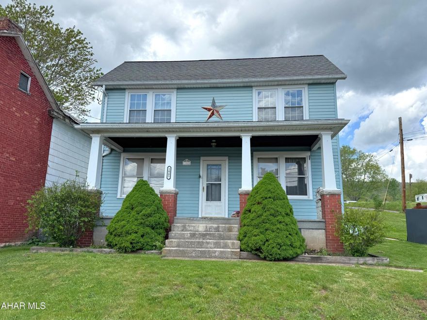 Central location on this three bedroom, two-story home between Bedford and Cumberland, MD!! The main level features a living room, dining room, kitchen with pantry, and a laundry/mud room. Second level features three bedrooms and a full bath. Walk-up attic with floor that is great for storage. Partial basement with walk-out access, oil forced air heat and 200-amp electric. Public water and a private septic system. Over-sized detached two-car garage with electric, water, and finished with knotty pine boards on the interior. Nice size yard, country views from the front covered porch and a rear deck.