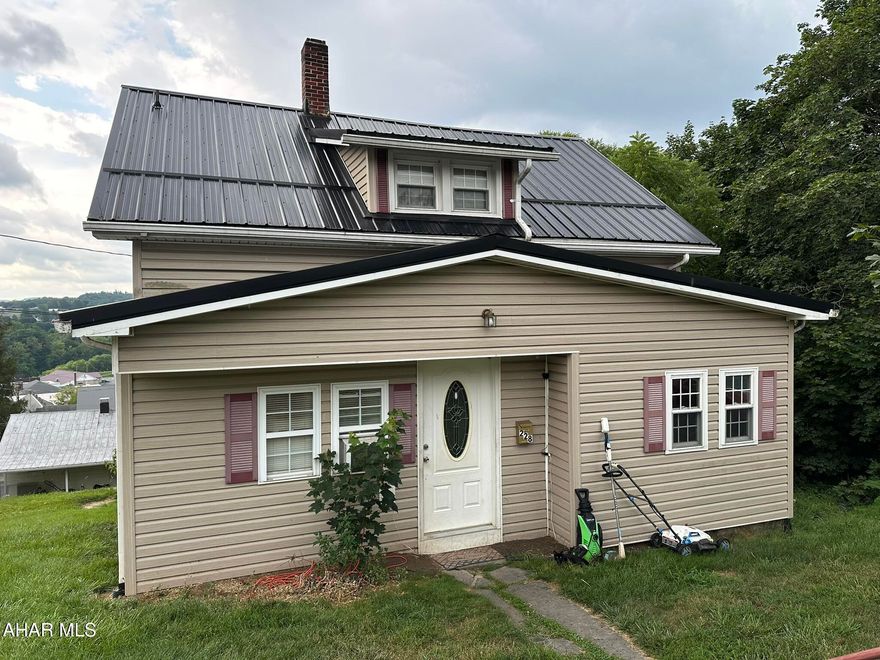 Efficient home in Everett borough is ready for it's new owner. Main floor features an open kitchen with space for an island or eat-in area. Separate dining room. Spacious living room. Bonus room off living area could be office or play room. Rear deck. Upstairs has two bedrooms and one full bath. Newer metal roof. Set up your showing today!