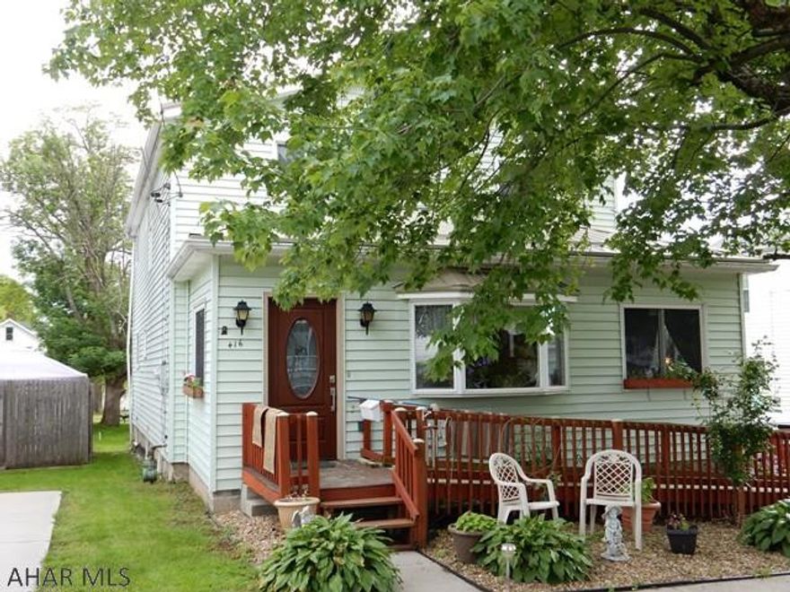 Big family? No problem. Many updates in this 4 Bedroom, 2 bath, 2 car garage home with room for everyone! Beautiful wood trim and stair case & wood columns with bookcases add character! The large Sun-room/Laundry is heated and is great for entertaining. Nice flat back yard too. This home is close to the community pool and local high school. New metal roof on house and garage. AC unit is ready for new owners to hook up.