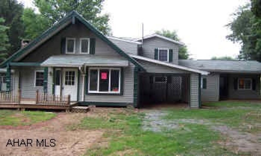 sold as is. Call listing office for special showing instructions and addendum.  Fixer-upper with lots of potential.  2 bedroom home with a 1 bedroom mother-in law suite with separate entrance.  Home has some freeze damage.  Call office for details.