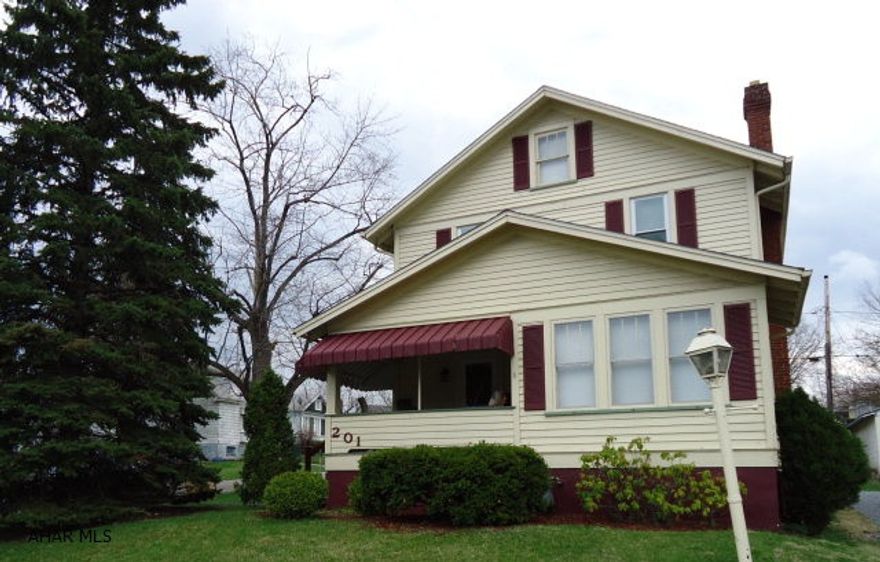 Corner Lot, 1.5 Baths , Sunroom, Living Room with Wood Fireplace, Convenient Location. Nice Decorating, Well Maintained. Please park behind the house and not in the shared shaled driveway.