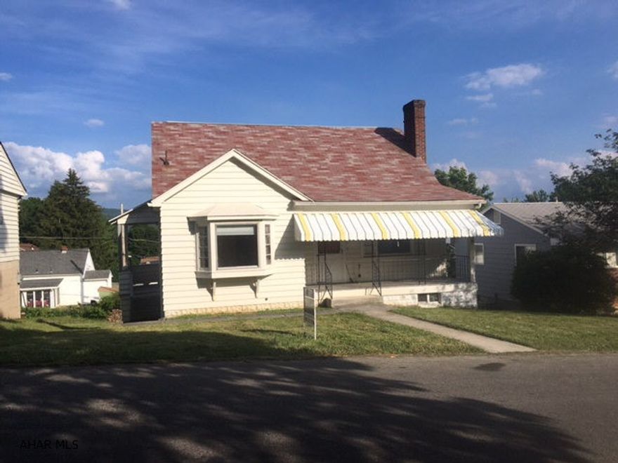 Adorable Cape Cod in Calvert Hills. This home is larger than it looks! It has 4 bedrooms, 1.5 baths, hardwood floors, modern bath and 2 kitchens.  Don't miss out- call to schedule your appointment now!