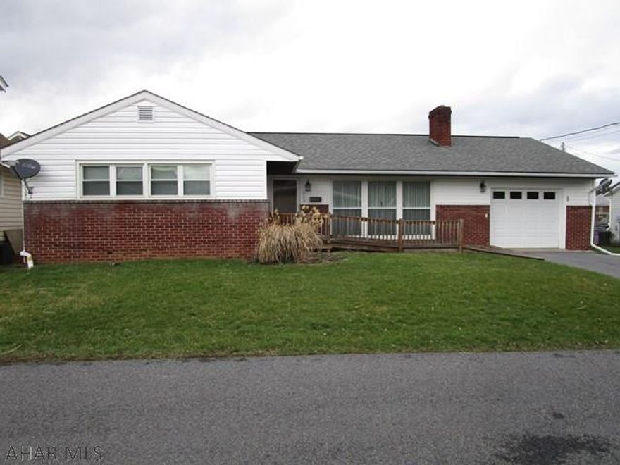 Nicely updated rancher in the Bedford Borough, just blocks from downtown.  Updated kitchen, hardwood floors, architectural shingle roof, thermo pane windows, oil forced air heat and central air-conditioning.  Large living room with over sized windows & wood burning fireplace, dining area, kitchen, three bedrooms and a full bathroom.  The basement is partially finished with a rec room and bedroom.  Laundry area and half bathroom also located in the basement.  One-car attached garage, front porch and a level back yard.  Move-in ready!!