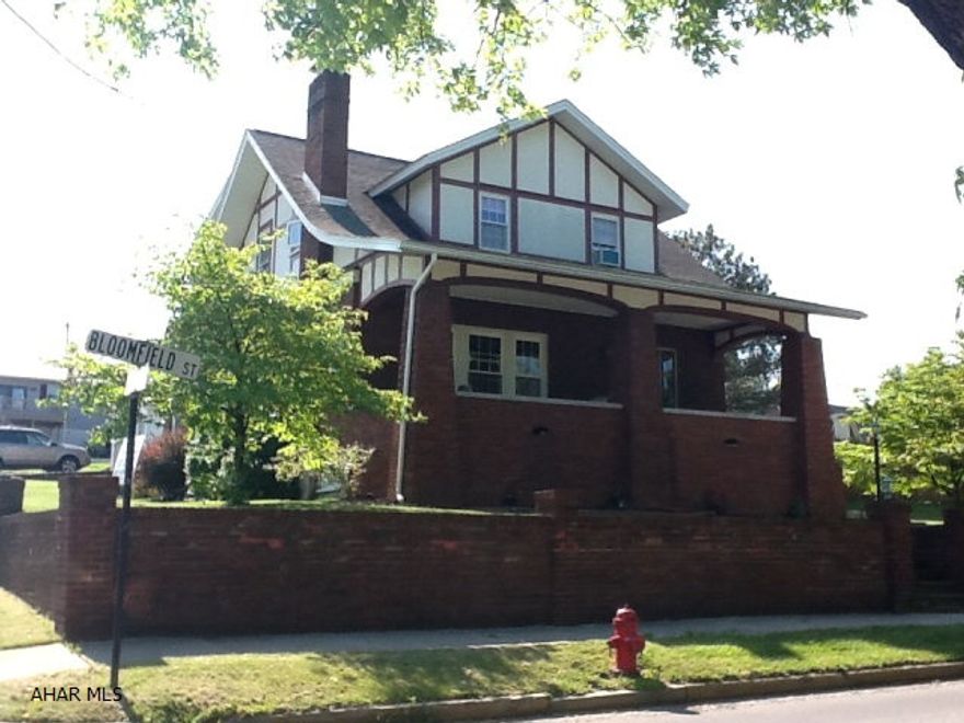 Beautiful Classic Brick with old charm and contemporary conveniences. Stained glass, beveled glass, pocket doors, quaint wood benches, old custom built-ins, 2/fireplaces gives this home charm. 4 bedrooms, walk-in closets, eat-in kitchen, patio, deck, fencing, garage, hot tub and 18 x 36 inground pool for todays contemporary family. Great location on corner lot.