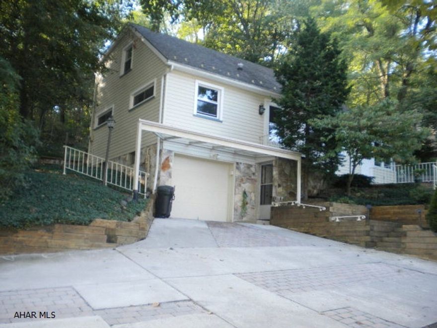 Country setting. Close to the city. Includes extra lot 900 32nd St. 54x111 Irr. Lot size is 66x109 Irr. (House) Familyroom with fireplace. 3 season room. New windows.