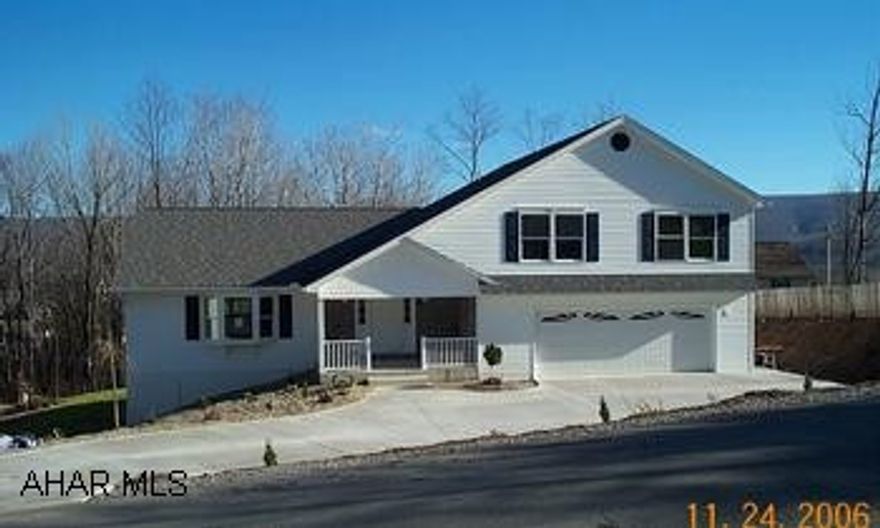 Cathedral Ceilings with Open Floor Plan, Covered Front Porch, Back Deck & Patio, Concrete Driveway, Skylights, Oversized Garage, 2 Furnances and 2 Central air Conditioners,Bonus Room, Ceilings Fans.,Level Backyard, Professionally Landscaped.  New Construction on 87x120 Lot - Approx 3800 sqft Finished Living Area - Oak Trim, Hickory Kitchen - Incredible Tax Savings, including no State, Local, or Real Estate Taxes until 2014.  Potential Savings of $50,000 or more.  Call for worksheet.Convenient to Altoona Campus And Altoona Hospital.