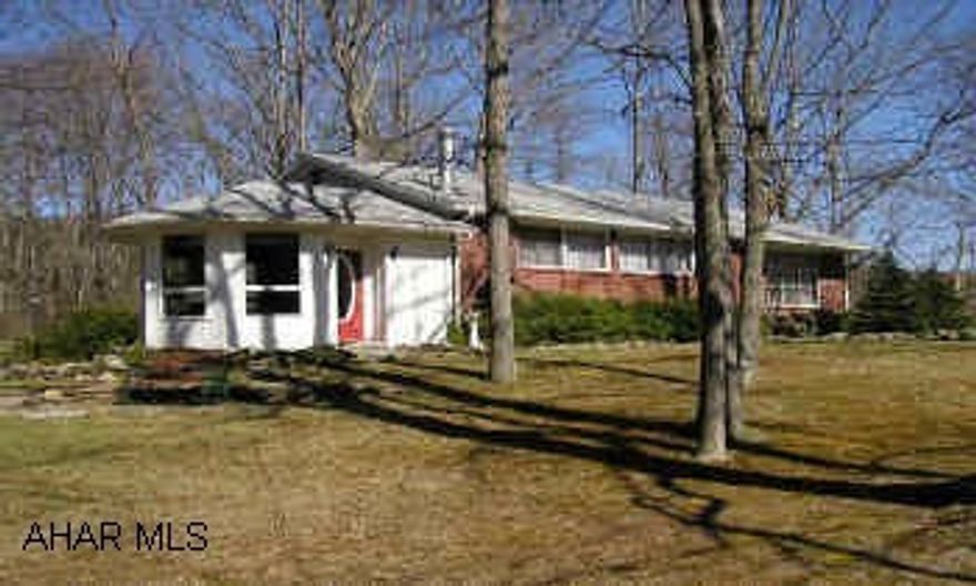 Well maintained Brick/Shingle Ranch on one acre beautifully shaded lot. Full unfinished basement with 1 car integral garage. 3 Bedrooms, 1 full and 3/4 master bath, new hot water furnace, cheerful sunroom, hardwood floors.