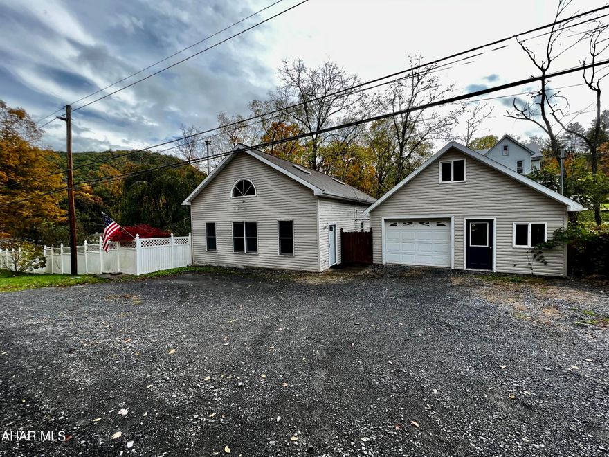 Just a short commute to State College, this beautifully updated home is move in ready! The welcoming living room features a vaulted ceiling along with new flooring as well as a newer wood stove. Overlooking the living room is a large master suite with full bathroom. Outside you can enjoy privacy on the covered deck located within the fenced in yard. The well, septic system and electric panel were all newly replaced in 2020. The large garage features a finished loft with endless possiblities! Call for your showing!