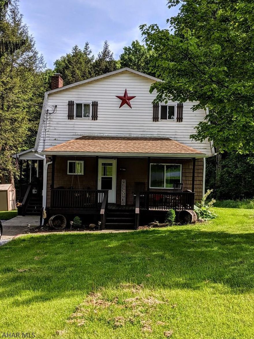 You can't miss out on this spacious 4 Bedroom, 3- Full Bath home located in the Central Cambria School District!  What's unique about this home is the back addition, which includes an area for a kitchen, living/den area, and full bath. This area could be used as den or separate living area. Large bedroom with adjacent bath on first floor. Back entrance with closet/mud room and first floor laundry. There are three bedrooms on the second floor with a full bath. Upgrades include a new roof, furnace, carpeting and water line & sewer in 2016.  This home is situated on a partially wooded 1 acre of land. Sit on the front porch and watch the deer across the road, or sit out around the backyard fire pit in the evenings. Within walking distance to Loraine Park!