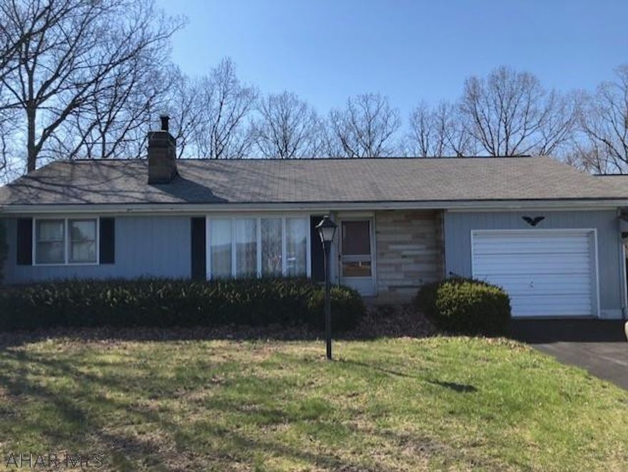 WHAT A VIEW!!!!  Two bedroom, 1  bath home on 2+ acres.  Nice country setting with gorgeous views.  1 car attached garage and a two car detached garage.