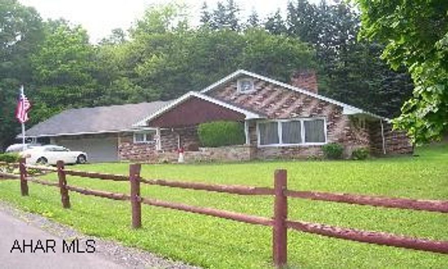 WELL CONSTRUCTED & GREATLY CARED FOR. LARGE LR WITH FIREPLACE. NEAT KITCHEN. FORMAL DINING ROOM. LAUNDRY 1ST FLOOR. NEWER FURNACE & ROOF. PRIVATE COVERED PATIO. ALL THIS ON 2 ACRES. BASEMENT IS IN THE PROCESS OF BEING WATERPROOFED.