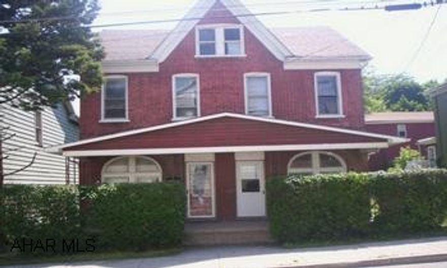 Brick double house - good investment property, separate utilities, newer roof.  "As Is"  No plumbing in property.  IF NEW PLUMBING INSTALLED - PRICE IS $17,000. Property sold "As Is".  No plumbing in property.  IF NEW PLUMBING INSTALLED - PRICE IS $17,000.