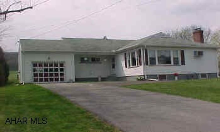 Great 3 BR ranch home with eat-in kit, dining area, gas fireplace, and beautiful oak hardwood floors.  New vinyl thermopane windows, newer furnace, gas hot water heat, and newer roof.  New insulation in 2005.