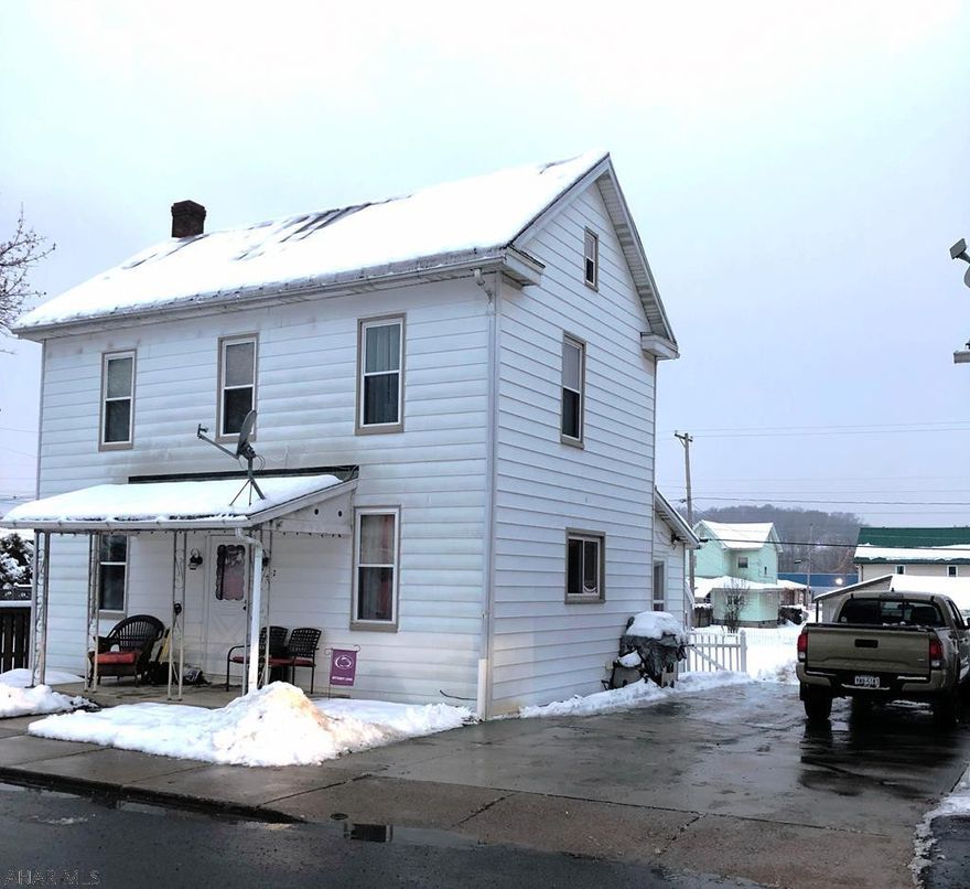 Beautifully maintained and updated 2 bedroom, 1 full bath home located in Hollidaysburg Area School District! The large kitchen features new flooring & the laundry room is located right off the kitchen for convenient access. New laminate flooring & fresh paint in the large living room right next to the kitchen. New carpet and fresh paint in the stairwell and both bedrooms. The 2nd floor also features a newly remodeled full bath with new laminate flooring & a modern rustic chic design. Brand new Fujitsu ductless units on 1st & 2nd floors that provide energy-efficient heating & cooling. Large, flat fenced-in backyard is great for entertaining and pets! Includes off-street parking and a detached garage. This is a must-see gem in a convenient location in Duncansville!
