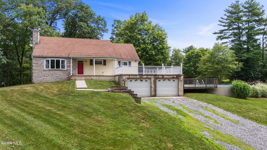 4-bedroom, 1.5 bath home on 2.23 private acres.